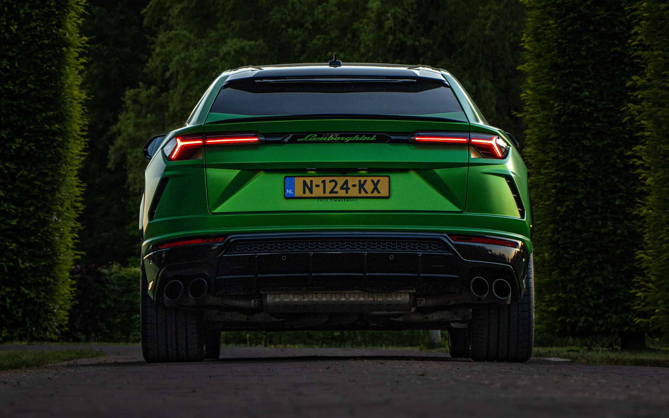 Groene Lamborghini van achteren